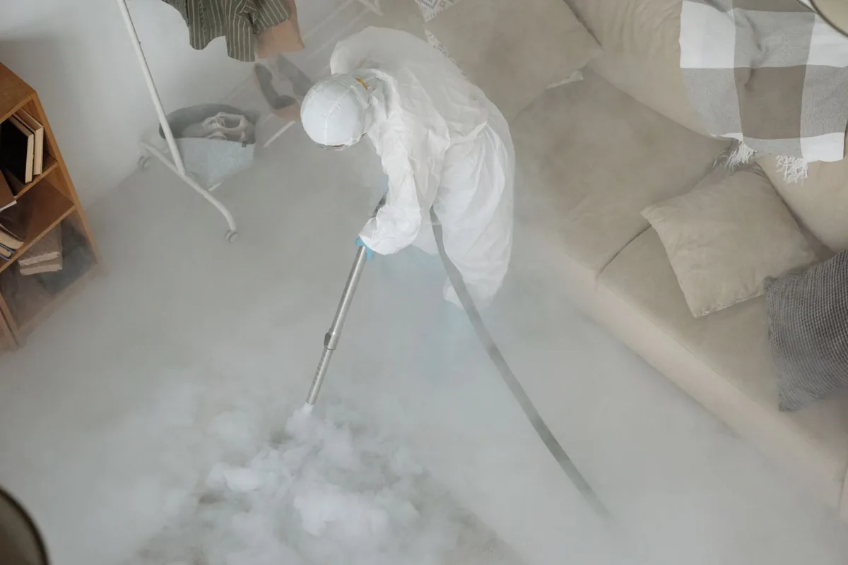 Biohazard cleanup technician in protective equipment, Pleasant Valley, WV